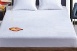 Coral fleece waterproof mattress protector, mega king size.