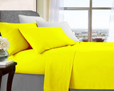 Yellow microfibre bed sheets, king size.