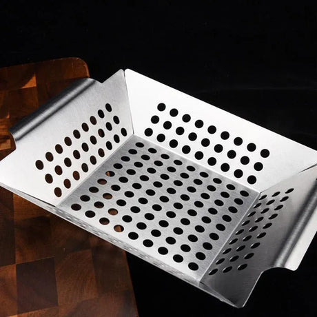 Stainless steel barbecue basket.