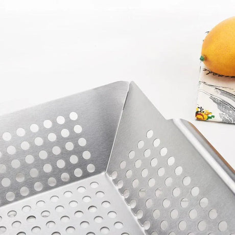 Stainless steel barbecue basket.