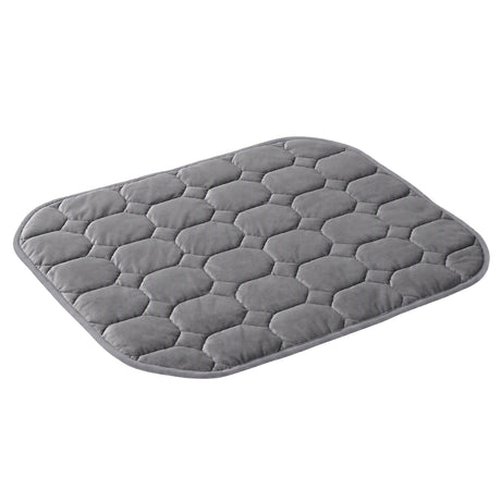 Grey velvet quilted weighted lap blanket.