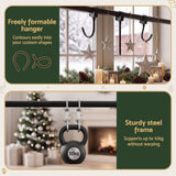 The over-door wreath hanger shown again, fitting without drilling.