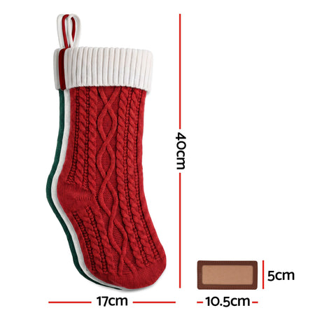 Another view of the three knitted stockings.