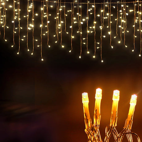 The 32m warm white icicle lights shown again, running on low voltage.