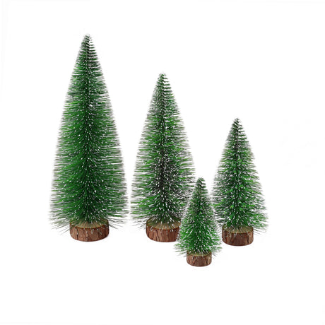Set of four frosted mini Christmas trees for a table.