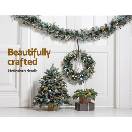 2.7m snowy LED garland, arriving pre-lit.