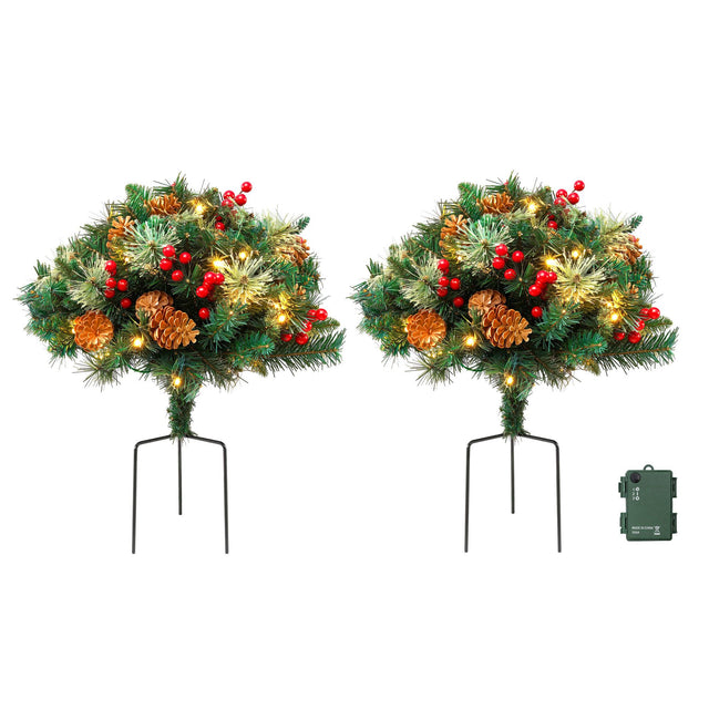 Pair of lit artificial Christmas trees 45cm tall for a pathway.
