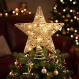 The gold LED star tree topper from another angle, battery operated.