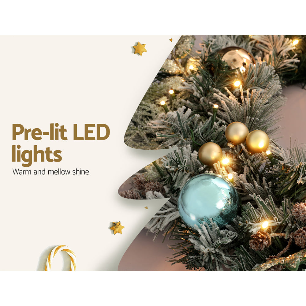 60cm snowy LED wreath, for indoor or outdoor use.