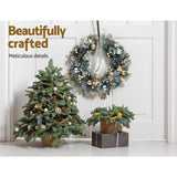 60cm snowy LED wreath, arriving pre-lit.