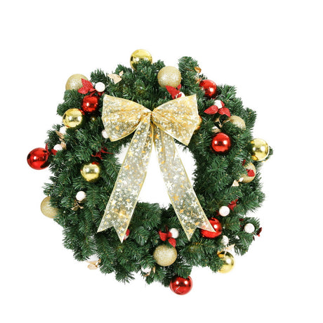 Pre-lit Christmas wreath 60cm across with berries, a bow and baubles.