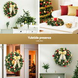 The 60cm pre-lit wreath shown again, battery operated.
