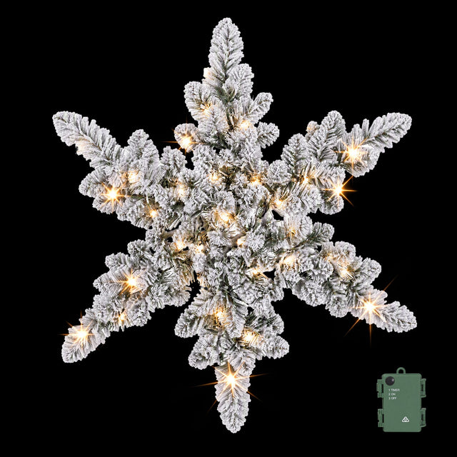 Flocked Christmas wreath 60cm across, pre-lit with 40 LEDs and snowflakes.
