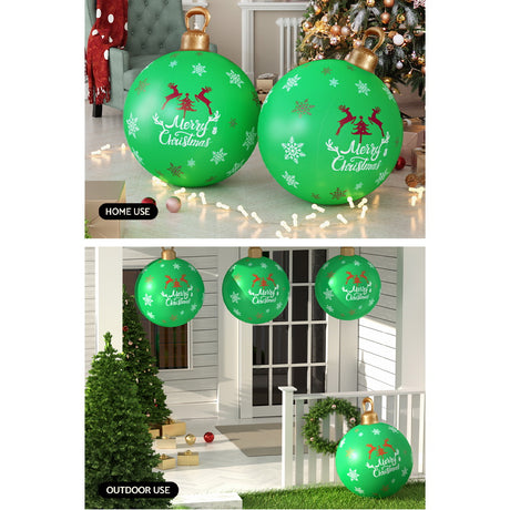 The green inflatable bauble shown again, deflates flat for storage.