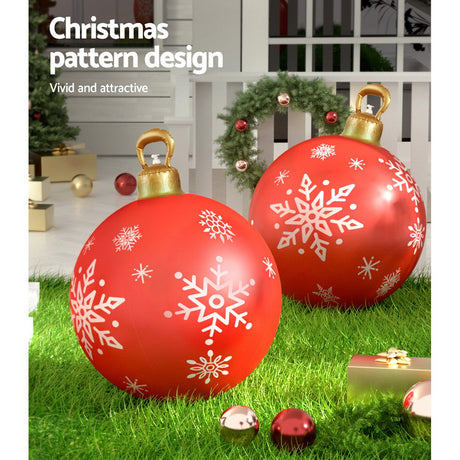 The red inflatable bauble shown again, for indoor or outdoor use.