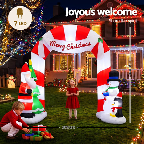 Another view of the inflatable Santa archway, with a built-in air blower.