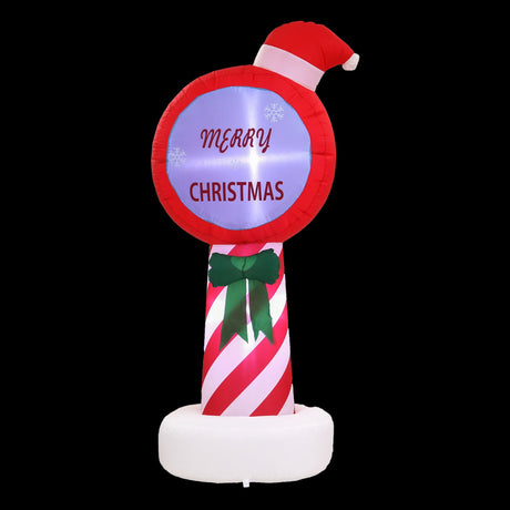 Inflatable Christmas pole decoration 1.8 metres tall, lit by internal LEDs.