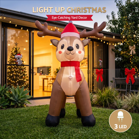 Another view of the inflatable reindeer, with pegs and ropes for anchoring.