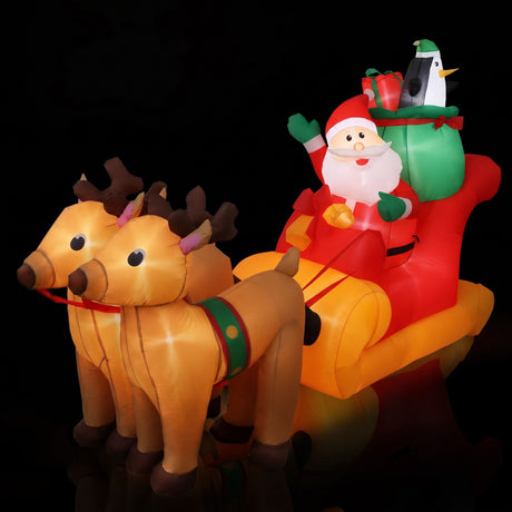 Inflatable Santa and sleigh 2.2 metres tall, lit by internal LEDs.