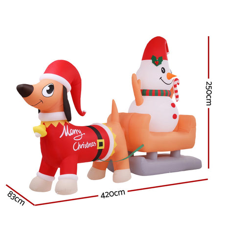 Another view of the inflatable snowman and dog, mains powered with a transformer.