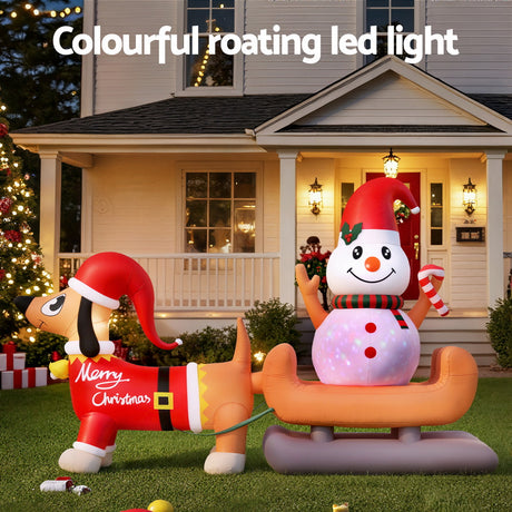 Another view of the inflatable snowman and dog, weather resistant.