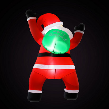 Another view of the inflatable climbing Santa, mains powered with a transformer.