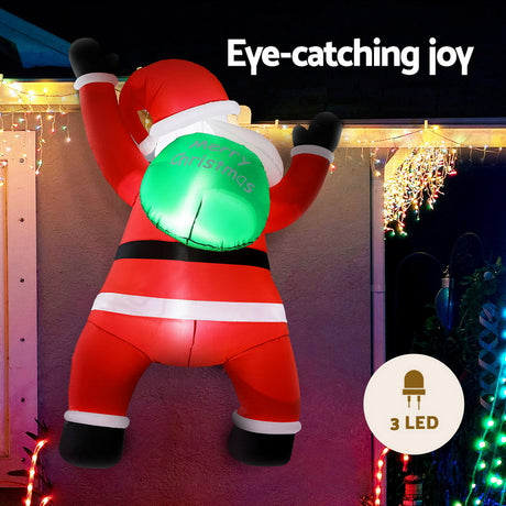 Another view of the inflatable climbing Santa, with a built-in air blower.