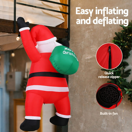Another view of the inflatable climbing Santa, with pegs and ropes for anchoring.