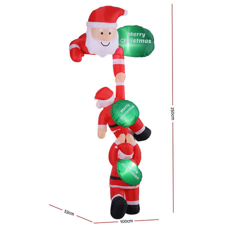 Another view of the inflatable climbing Santa, mains powered with a transformer.