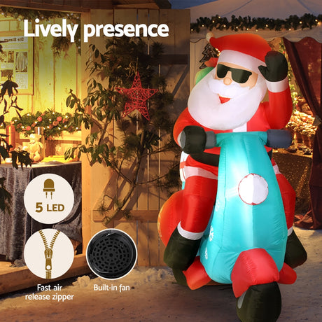 Another view of the inflatable Santa motorbike, with a built-in air blower.