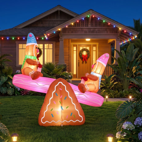The inflatable Christmas seesaw shown again, with a built-in air blower.