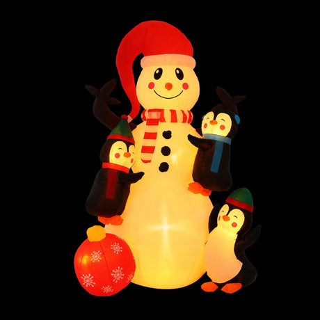 Inflatable snowman 1.8 metres tall, lit from inside with warm white LEDs.