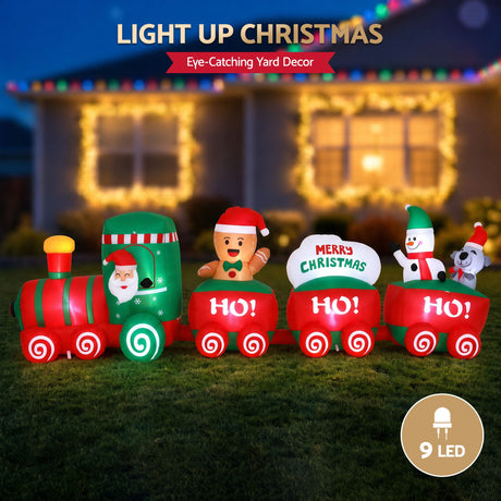 Another view of the inflatable Santa train, with pegs and ropes for anchoring.