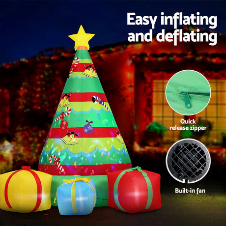 Another view of the inflatable gift tree, with pegs and ropes for anchoring.