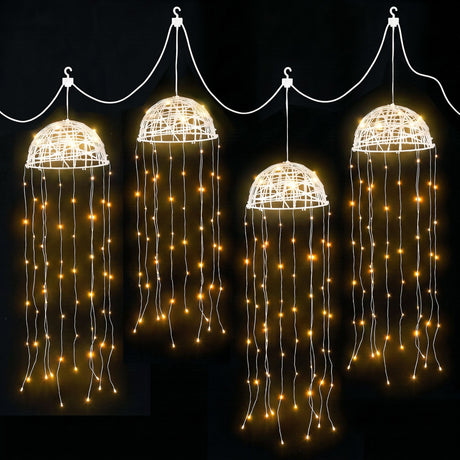 Four solar jellyfish garden lights with warm white LEDs.