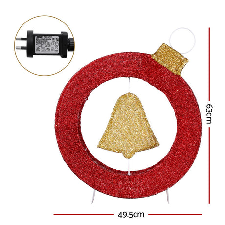 Another view of the bell and wreath motif light, running on low voltage.