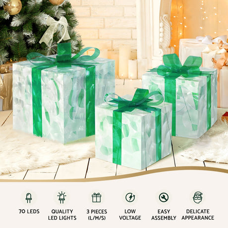 Another view of the three lit gift boxes, with a built-in timer.