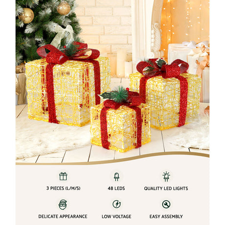 Another view of the three lit gift boxes, in UV-resistant material.