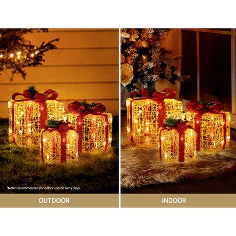 Another view of the three lit gift boxes, running on low voltage.