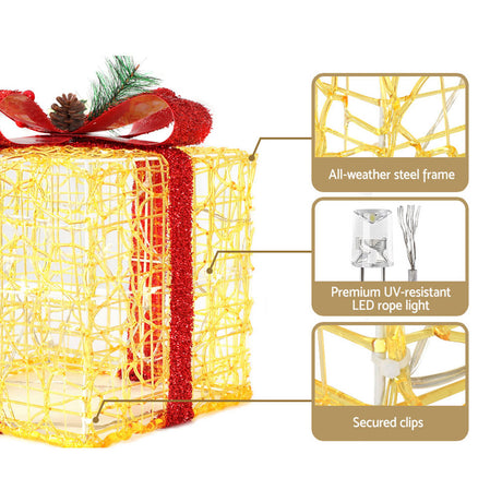 The three lit gift boxes shown again, mains powered with a transformer.