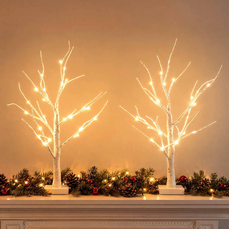 Pair of lit branch trees 60cm tall with warm white LEDs.