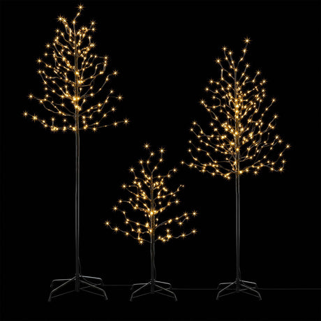 Set of three lit birch trees with warm white LEDs, for indoors or outdoors.