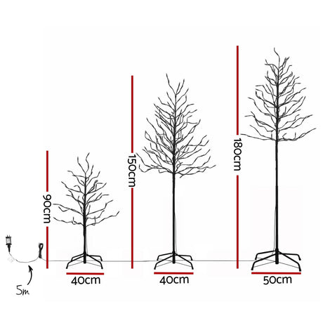 Another view of the three lit birch trees, mains powered with a transformer.