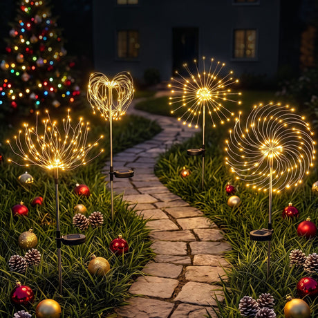 Four solar firework garden lights with warm white LEDs.