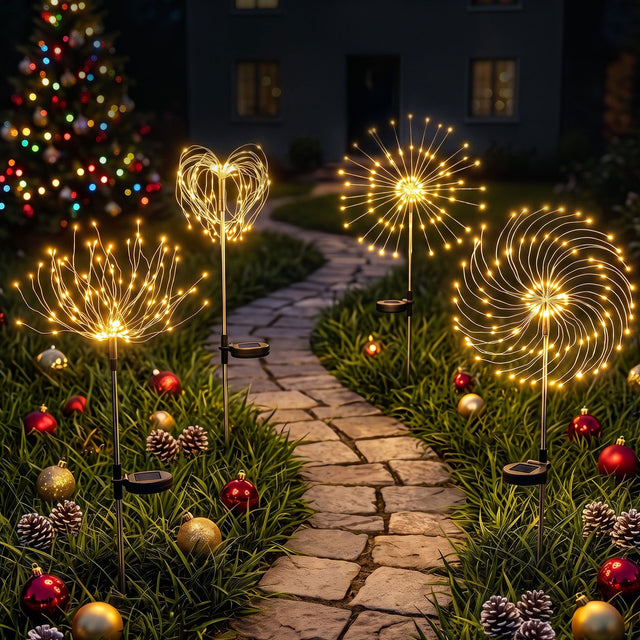 Four solar firework garden lights with warm white LEDs.