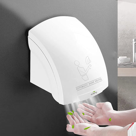 Dolphy Eco white hand dryer on a washroom wall blowing warm air onto hands