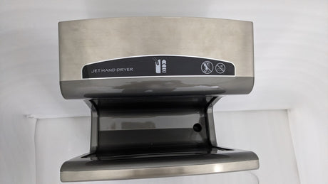 Top of the Dolphy jet hand dryer showing the hand slot and indicator panel