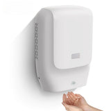 Dolphy white 1450W touchless hand dryer on a wall with hands held under the outlet