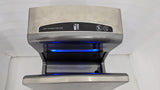 Close-up of the Dolphy jet hand dryer's lit hand slot