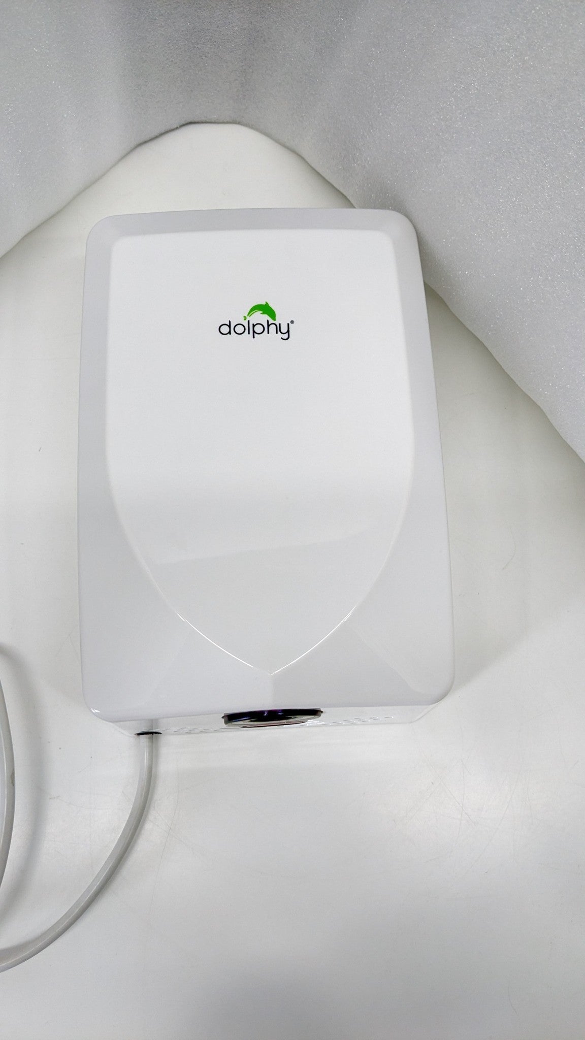 Dolphy white compact hand dryer from below, showing the air outlet